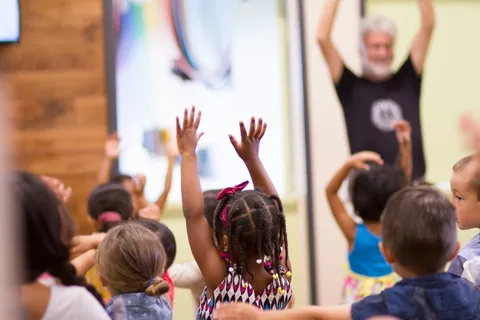 Children taking part in an interactive group activity